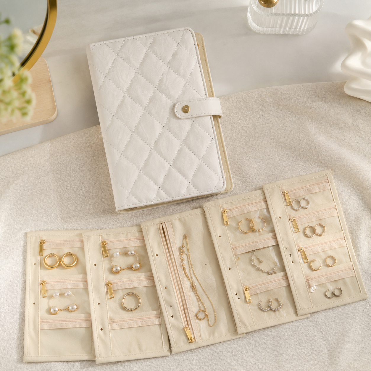 White quilted travel jewelry organizer book with insert page set