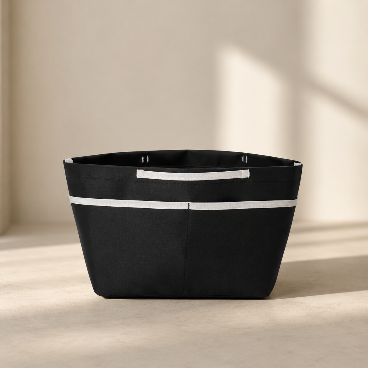 Small sealed black purse organizer insert with exterior pockets